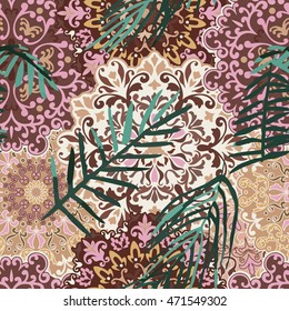 Seamless pattern with tropical leaves on ornament backgound.
