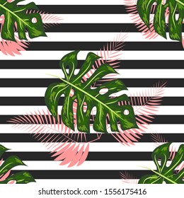 Seamless pattern with tropical leaves: palms, monstera. jungle leaf seamless pattern striped background