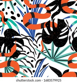Seamless pattern of a tropical leaves with snake.Summer vector print.