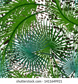 Seamless pattern of tropical leaves and spotted panthers, jaguars.