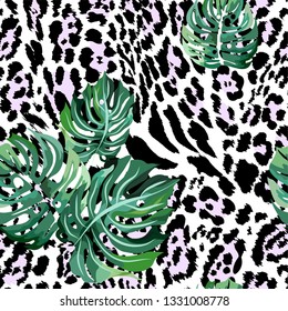 Seamless pattern with tropical leaves and stained panther, jaguar.