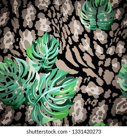 Seamless pattern with tropical leaves and stained panther, jaguar.