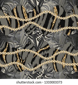 Seamless pattern with tropical leaves, stripes of tiger, zebra and strings of pearls.