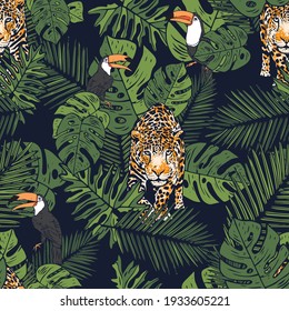 Seamless pattern of a tropical leaves with toucan and leopard background elements 