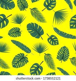 Seamless pattern with tropical leaves. Vector design. On a yellow background