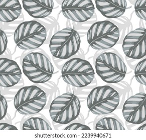 seamless pattern of tropical leaves.Seamless vector tropical pattern with black monstera palm leaves on dark background. Exotic hawaiian fabric design. 