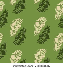 Seamless pattern with tropical leavs on a green background
