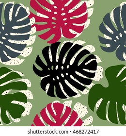 Seamless pattern with tropical monstera leaves. Vector background.