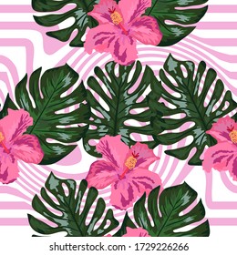 Seamless pattern with tropical orchid and hibiscus flowers, palm, banana and monstera leaves on striped background.