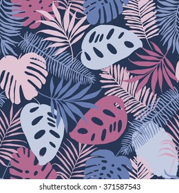Seamless pattern of tropical palm leaves. Vector background for your design.