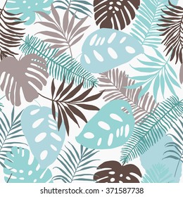 Seamless pattern of tropical palm leaves. Vector background for your design.