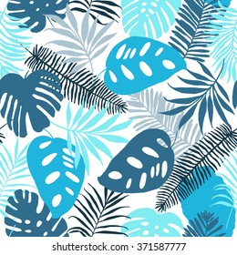 Seamless pattern of tropical palm leaves. Vector background for your design.