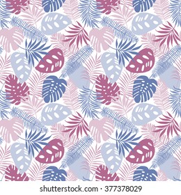 Seamless pattern of tropical palm leaves. Vector background for your design.