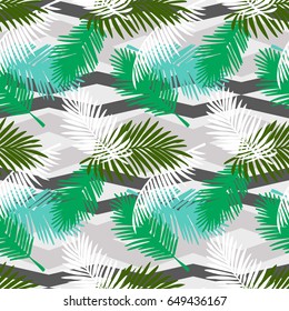 Seamless pattern tropical palm leaves on a geometric background. Vector tropic wallpaper design.