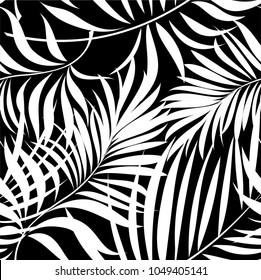 Seamless pattern of a tropical palm tree, jungle leaves. Monochrome vector image.