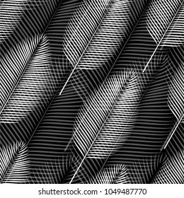 Seamless pattern of a tropical palm tree, jungle leaves. Monochrome vector image.