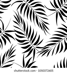 Seamless pattern of a tropical palm tree, jungle leaves.  Monochrome vector image.