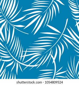 Seamless pattern of a tropical palm tree, jungle leaves. Vector floral pattern on blue background.  Hand drawing.