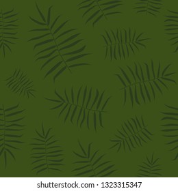 Seamless pattern with tropical palm tree leaves. Green color