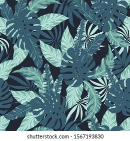 Seamless pattern with tropical plants and leaves. Floral seamless vector tropical pattern background with exotic leaves, jungle leaf. Illustration in Hawaiian style. Jungle leaves.