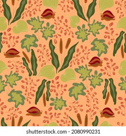 Seamless pattern with tropical plants and leaves on the orange background. Design for fashion, fabric, textile, wallpaper and a print on a different product.