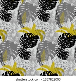 seamless pattern with tropical plants in monochrome shades of black gray and gold with leaves of monstera