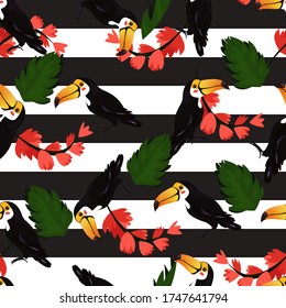 Seamless pattern tropical toucan , tropical flowers and palm leaves on black and white stripes background