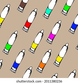 Seamless pattern from tubes with paints of different colors. Packaging paper, background.