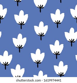 Seamless pattern with tulip flowers. Classic blue background and white petal. Simple botanical illustration. Floral doodle texture. Post cards, wedding design, wallpaper, textile and wrapping pape