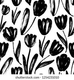 Seamless pattern with tulips. Abstract vector natural texture. Modern monochrome background. Black and white ink brush texture. Flowers grunge brushstroke drawing. Floral textile, wrapping paper.