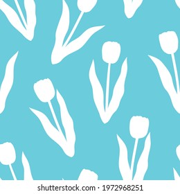 Seamless pattern tulips flowers white silhouettes blue background vector illustration
