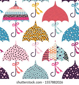 Seamless pattern with umbrellas. Can be used on packaging paper, fabric, background for different images, etc.