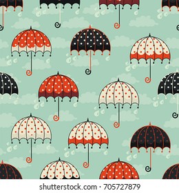 Seamless pattern with umbrellas. Fabric background. Beautiful abstract design, vector illustration
