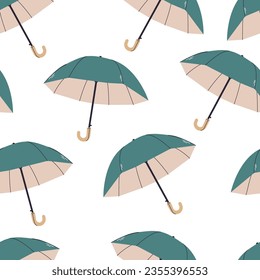 Seamless pattern with umbrellas.The green umbrella pattern . Pattern for printing on fabric, wallpaper, autumn materials. Protection from rain.