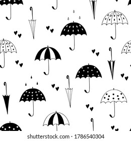 Seamless pattern with umbrellas and hearts. Black and white. Doodle style. Vector illustration.
