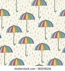 Seamless pattern with umbrellas and rain. Can be used for wallpaper, pattern fills, greeting cards, webpage backgrounds, wrapping paper or fabric. Vector illustration. EPS 10.