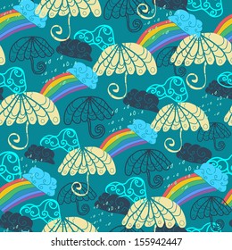 Seamless pattern with umbrellas and rainbow. Vector background.