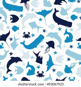 Seamless pattern with underwater fishes, dolphin, blue whale and crab