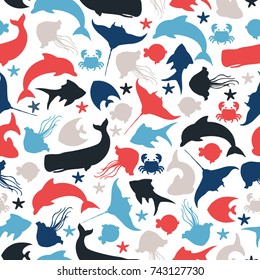 Seamless pattern with underwater fishes, dolphin, blue whale and crab