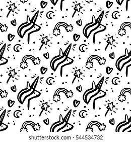 Seamless pattern with unicorn, magic wand, heart, moon, rainbow, cloud. Hand-drawing of black ink on a white background. Vector Image. 