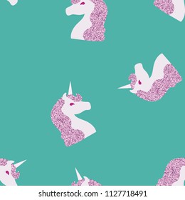 Seamless pattern with a unicorn on a blue background. Unicorn with brilliance.