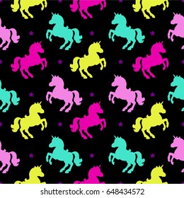 Seamless pattern with unicorn silhouette. Vector illustration. Cute magic background. Fantasy wallpaper