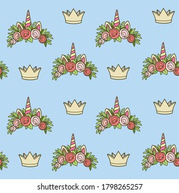 Seamless pattern from unicorn tiaras various shapes with flowers on blue background