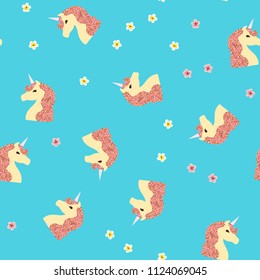 Seamless pattern with unicorn and tropical flowers on a blue background. Unicorn with brilliance.