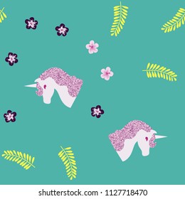 Seamless pattern with a unicorn, tropical flowers and leaves on a blue background. Unicorn with brilliance.