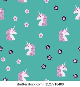 Seamless pattern with unicorn and tropical flowers on a blue background. Unicorn with brilliance.