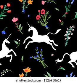 Seamless pattern. Unicorns among flowers and herbs. Large set of beautiful wildflowers. Summer meadow. Great for fabric, wrapping paper, for Halloween greeting cards and more.