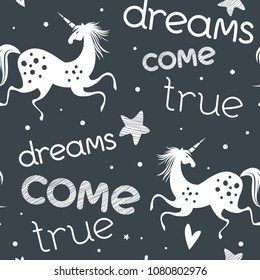 Seamless pattern with unicorns. Black and white. Vector banner, apparel design, fabric print. Motivational poster with hand drawn lettering "Dreams come true". Trendy background with positive quote.