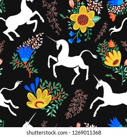 Seamless pattern. Unicorns, flowers and magical herbs. Great for Halloween greeting cards, for printing on t-shirts and more.
