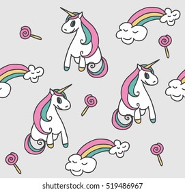 Seamless pattern with unicorns, rainbow and lollipops. Baby background.